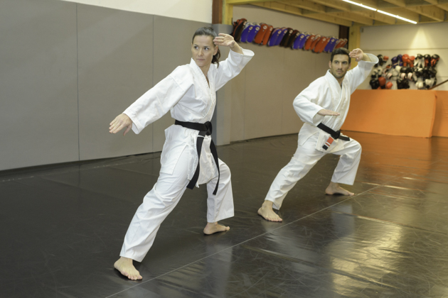 martial arts misconceptions, woman and man practicing martial arts