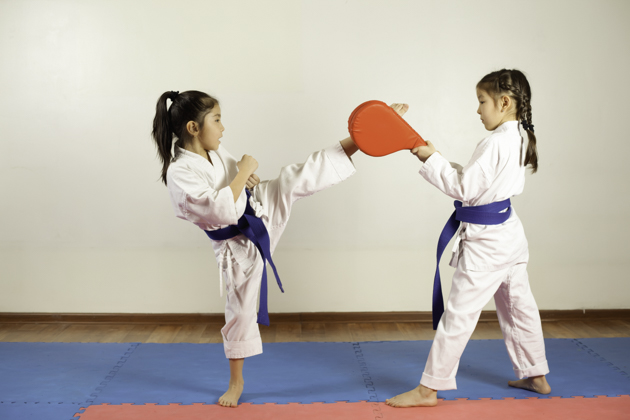 martial arts misconceptions, two girls practicing martial arts