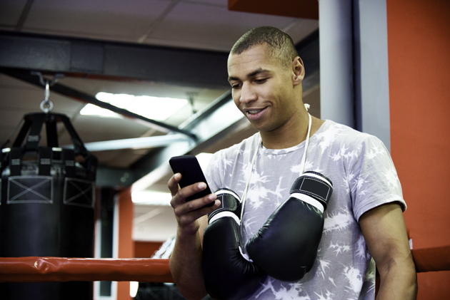 martial arts software, boxer on phone